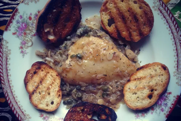 Fish fillet, cooked with capers and white wine