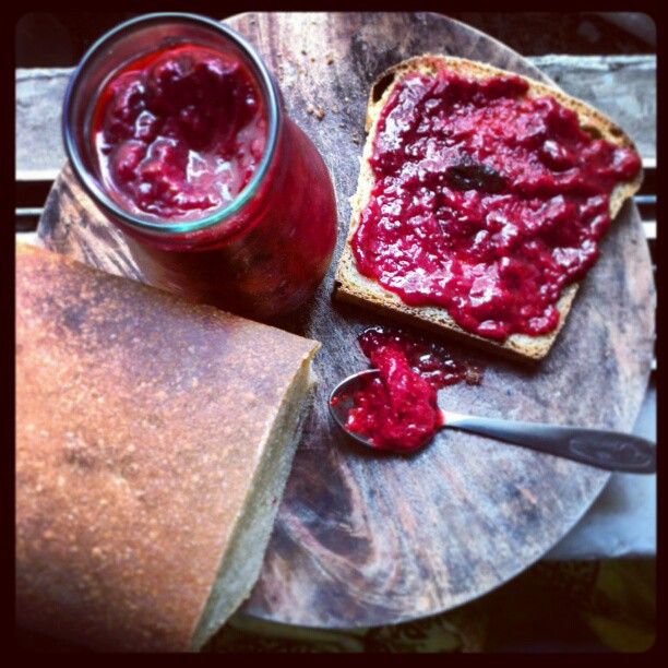 a jar of strawberry-mint jam and home made mread.