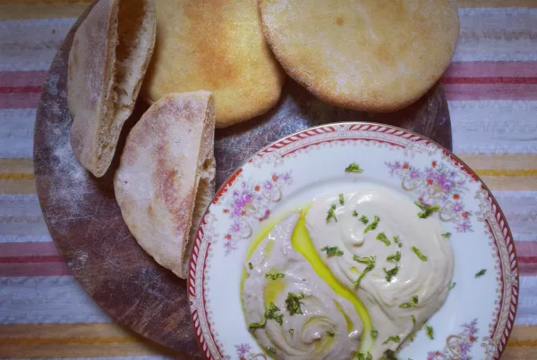 Golden home made Pita, with ultra smooth hummus and Baba Ganoush